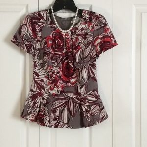 Short sleeve peplum blouse.